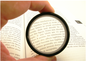 Picture: magnifier over a page of text